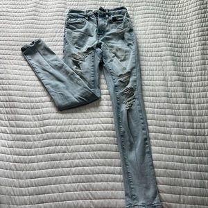 Girls light blue ripped jeans